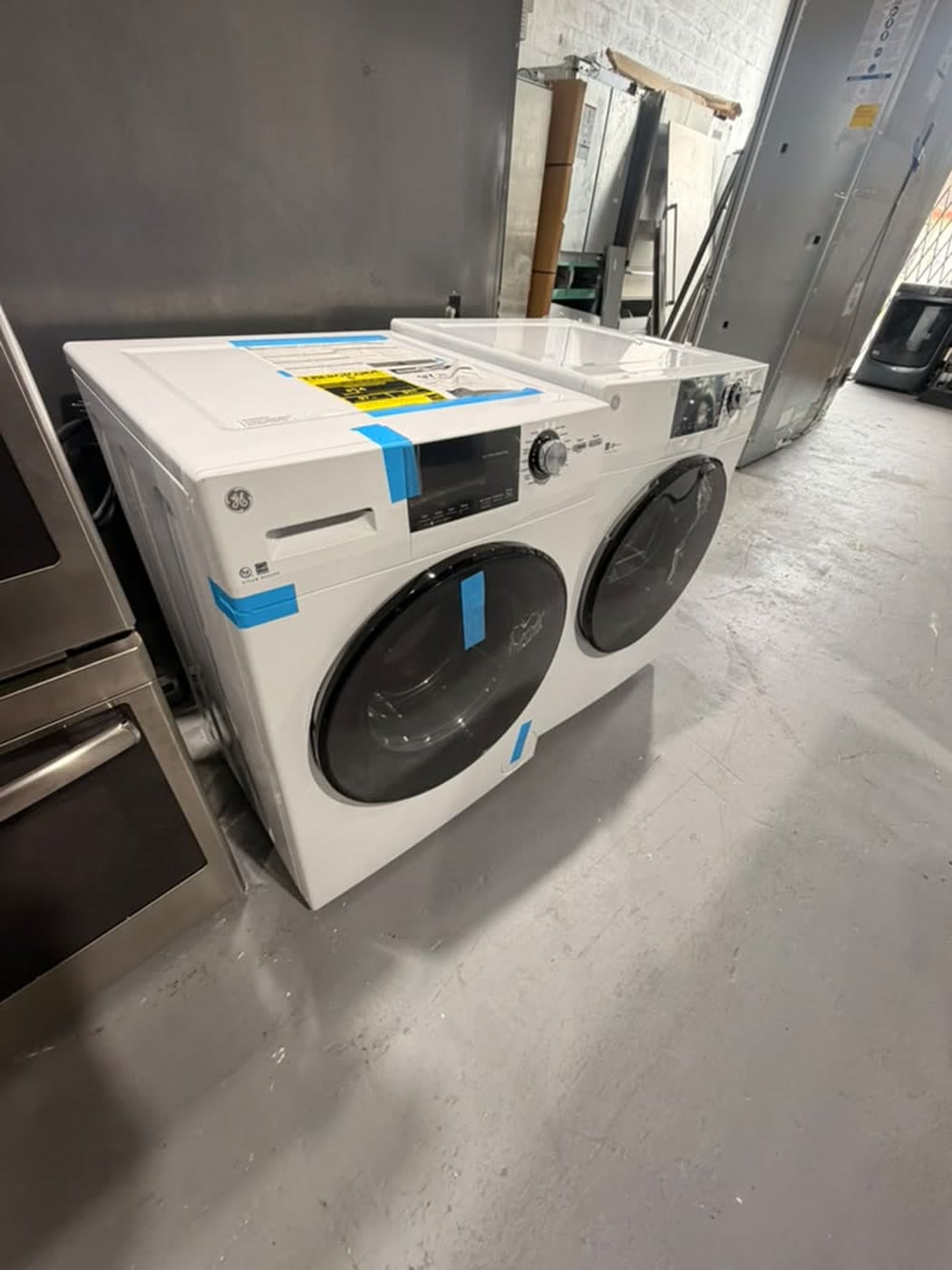 Actual ge 24-inch washer and dryer set photographed in Oakland Park — actual set · alternate front angle