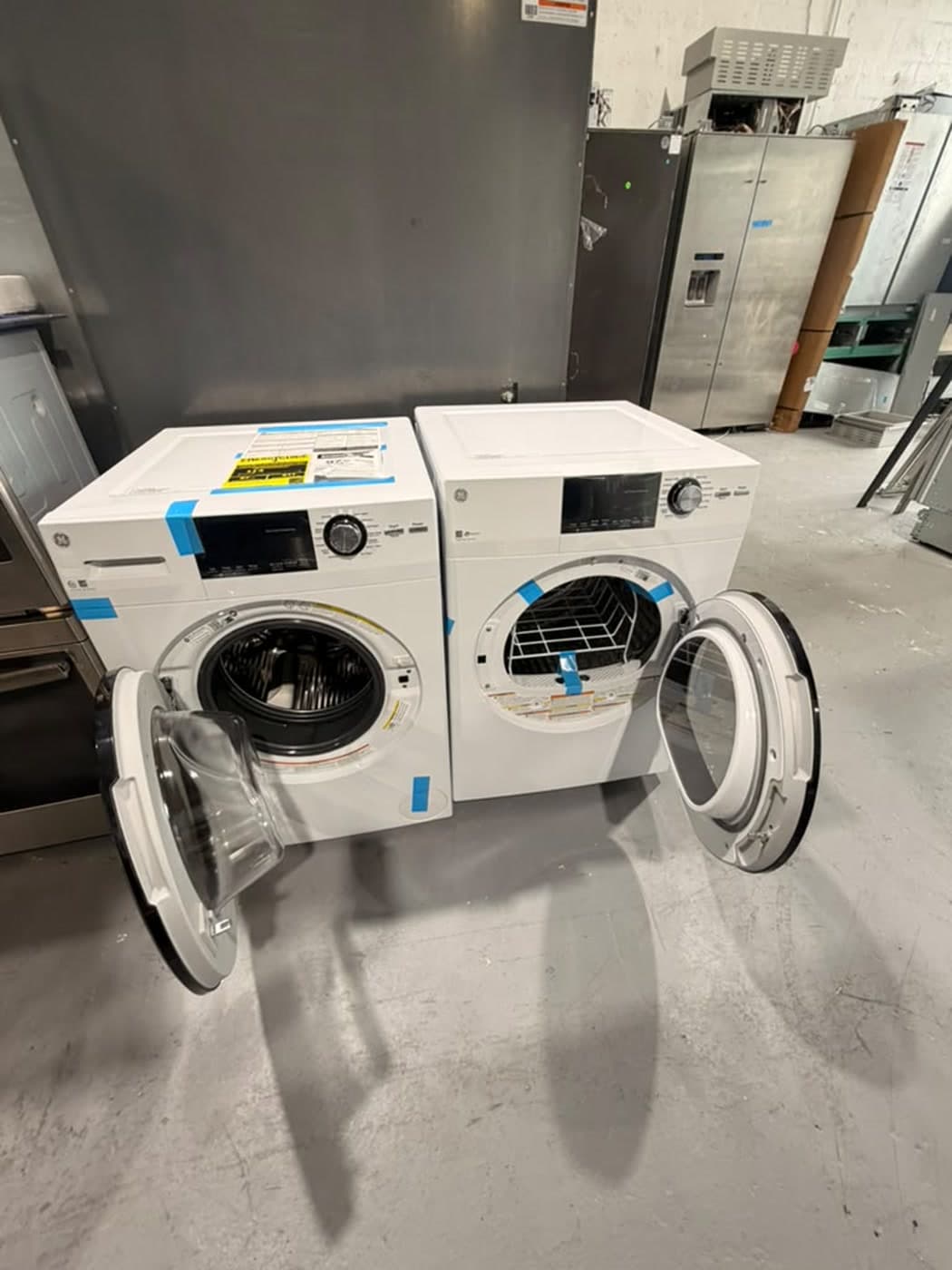 Actual ge 24-inch washer and dryer set photographed in Oakland Park — actual set · alternate open-door view