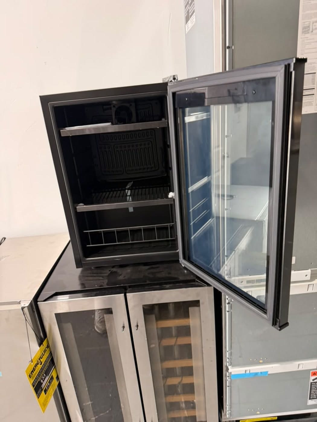 Actual wine enthusiast 17-inch beverage center photographed in Oakland Park — actual unit · open interior with shelves