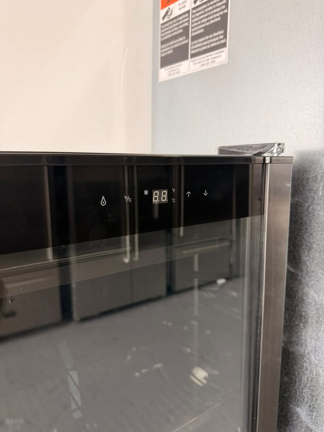 Actual wine enthusiast 17-inch beverage center photographed in Oakland Park — actual unit · digital control detail